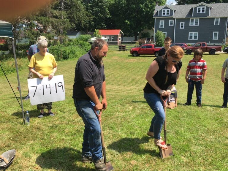 Neil and Megan breaking ground